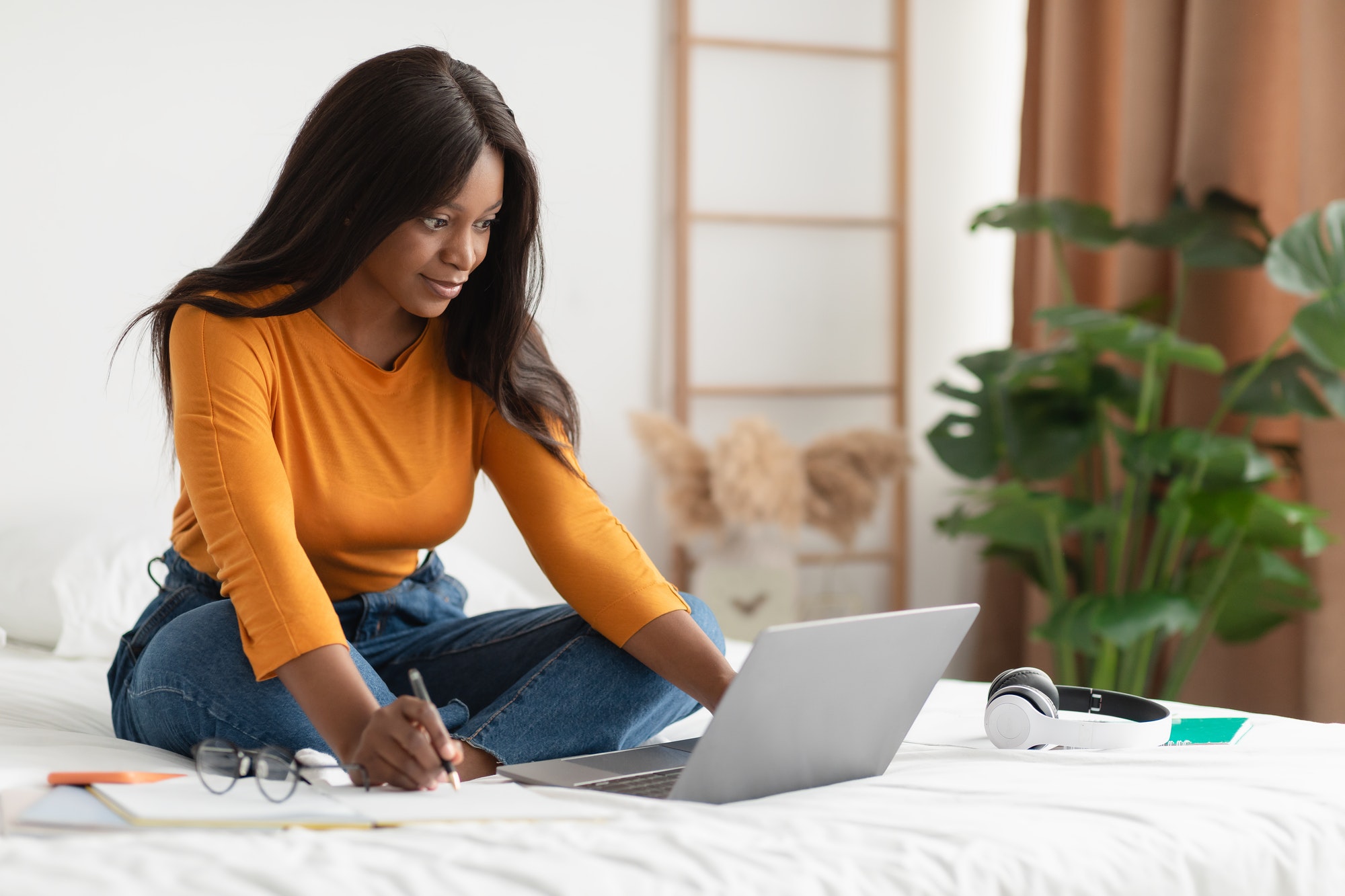 Black Woman Taking Notes Sitting At Laptop Learning At Home Long-Term Effects of Alcohol Abuse