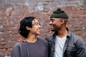 two people smiling with each other, happy with dr. watson's patient centric addiction treatment